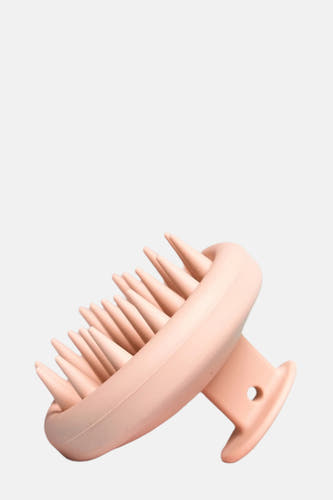 Produit de soin rose de WONDR CARE, avec des nœuds et une poignée avec un trou.