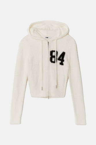 Cardigan blanc de TALLY WEIJL, avec capuchon, longues manches et "84" noir sur la poitrine.