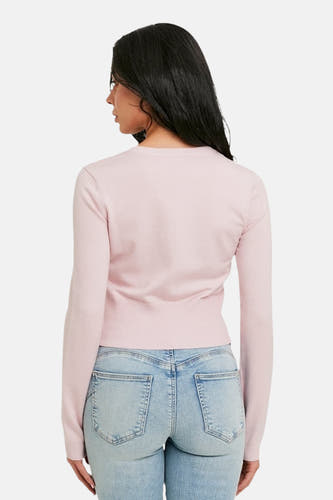 Roze cardigan van TALLY WEIJL, met lange mouwen en een geribbelde zoom, gedragen met een jeans, rugaanzicht.