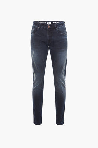Donkerblauwe slim fit jeans van Petrol Industries, met subtiele slijtage details.