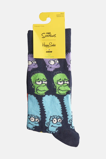 Multikleurige sokken van Happy Socks, met een cartoonprint van The Simpsons.

