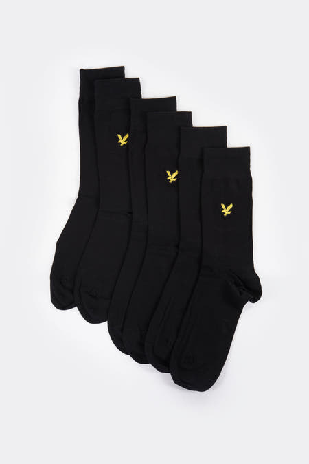 Chaussettes noires de Lyle & Scott avec détail de logo brodé.