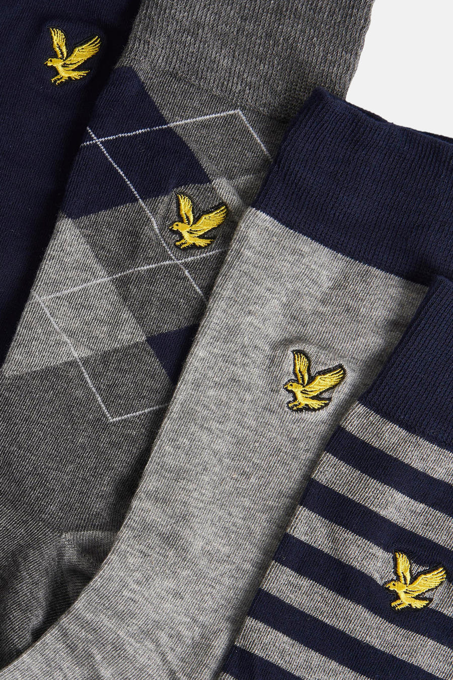 Meerkleurige sokken van Lyle & Scott, met een argyle ruitpatroon, strepen en het herkenbare adelaarslogo.

