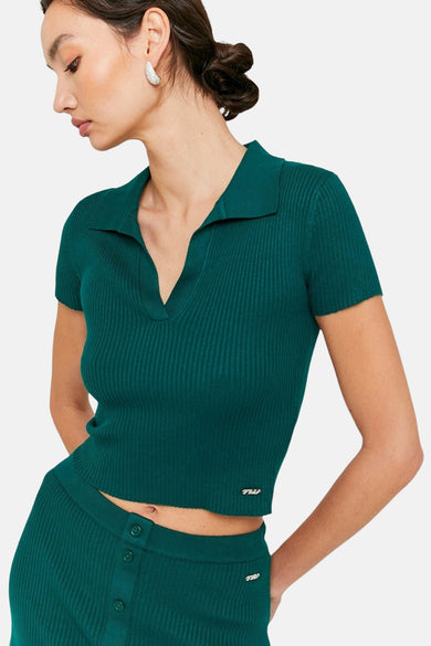 Groene polo met korte mouwen van TALLY WEIJL, met een geribbelde textuur en bijpassende rok.