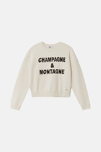Ecru trui met ronde hals van TALLY WEIJL, met de tekst "Champagne & Montagne" erop.