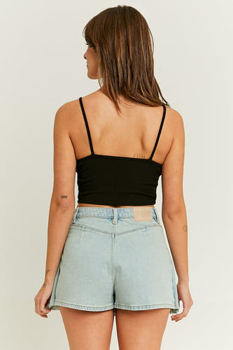 Lichtblauwe denim korte rok van TALLY WEIJL, met een effen kleur en een zichtbare merklabel aan de achterkant.