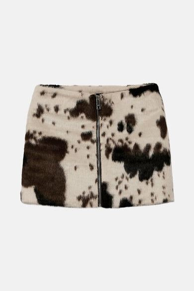Short skirt of imitation fur from TALLY WEIJL with a cow print and a silver zipper at the front.