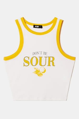 Witte singlet van TALLY WEIJL met gele rand en tekst 'Don't be sour' met citroen afbeelding.