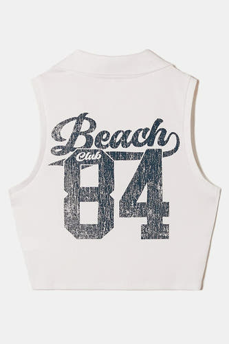 Witte top zonder mouwen van TALLY WEIJL met blauwe opdruk 'Beach Club 84', rugzicht.
