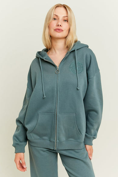 Gilet turquoise de TALLY WEIJL avec fermeture à glissière, capuchon et poches.