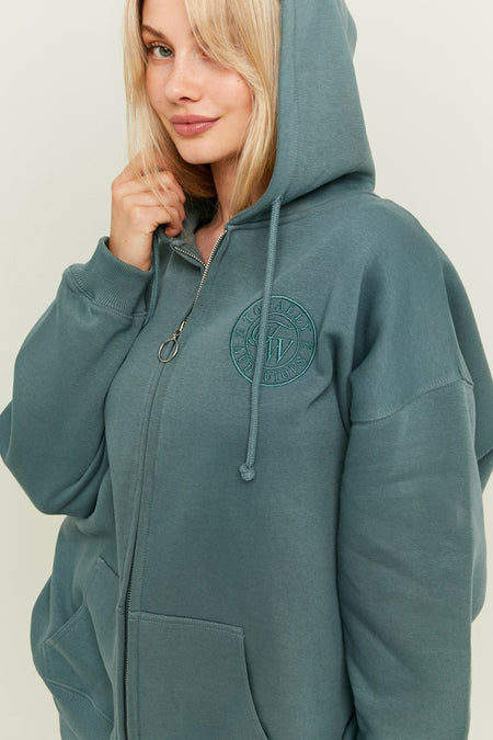 Gilet turquoise de TALLY WEIJL avec longues manches, capuchon et fermeture éclair.
