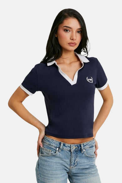 Blauwe polo met korte mouwen van TALLY WEIJL, met witte kraag en logo.