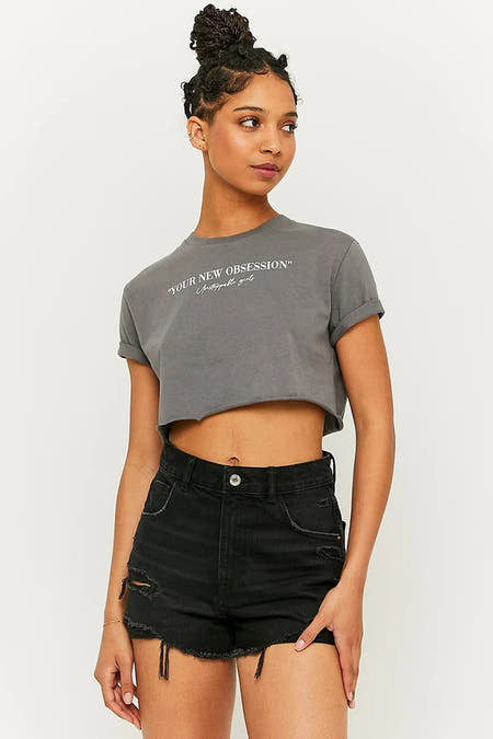 Grijs T-shirt van TALLY WEIJL, kort model met opgerolde mouwen en tekstprint.
