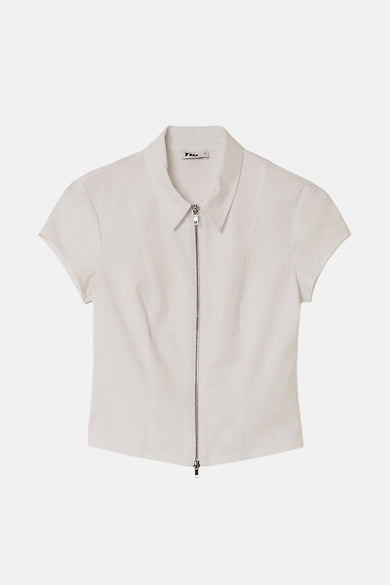 Witte blouse met korte mouwen van TALLY WEIJL met een ritssluiting aan de voorkant.
