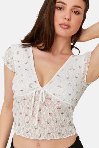 Ecru blouse met korte mouwen van TALLY WEIJL, met rozenbloemmotief en kanten details.