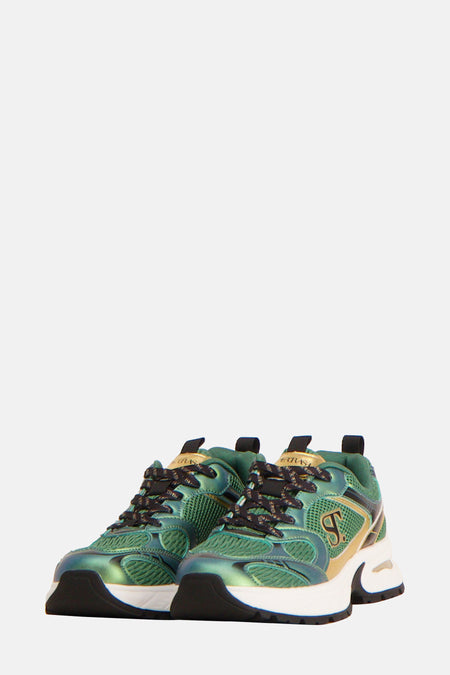 Groene sneakers van Supertrash met zwart-goudkleurige details, veters met merknaam en een witte zool.
