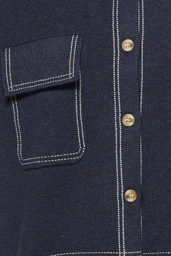 Blauw mouwloos vest van ADORE, met een opgestikte zak en knoopsluiting.