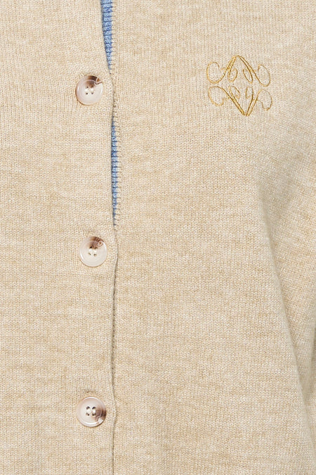 Pull beige ADORE avec fermeture à boutons et broderie décorative dorée.
