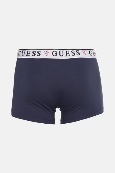 Boxershort de couleur bleu marine de Guess avec une ceinture blanche dotée de logo.