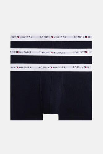 Blauwe boxershorts van TOMMY JEANS, met een witte elastische band met logo.
