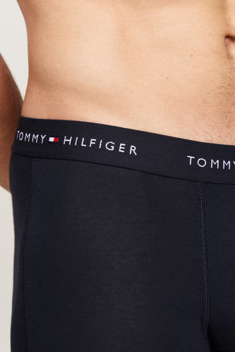 Blauwe boxershort van TOMMY JEANS, met een elastische tailleband met het merklogo in wit.
