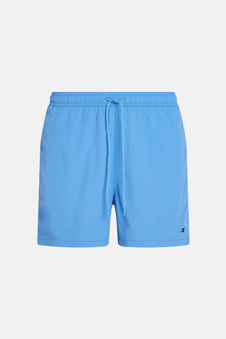 Blauwe zwemshort van Tommy Hilfiger, met een trekkoord en het logo rechtsonder.
