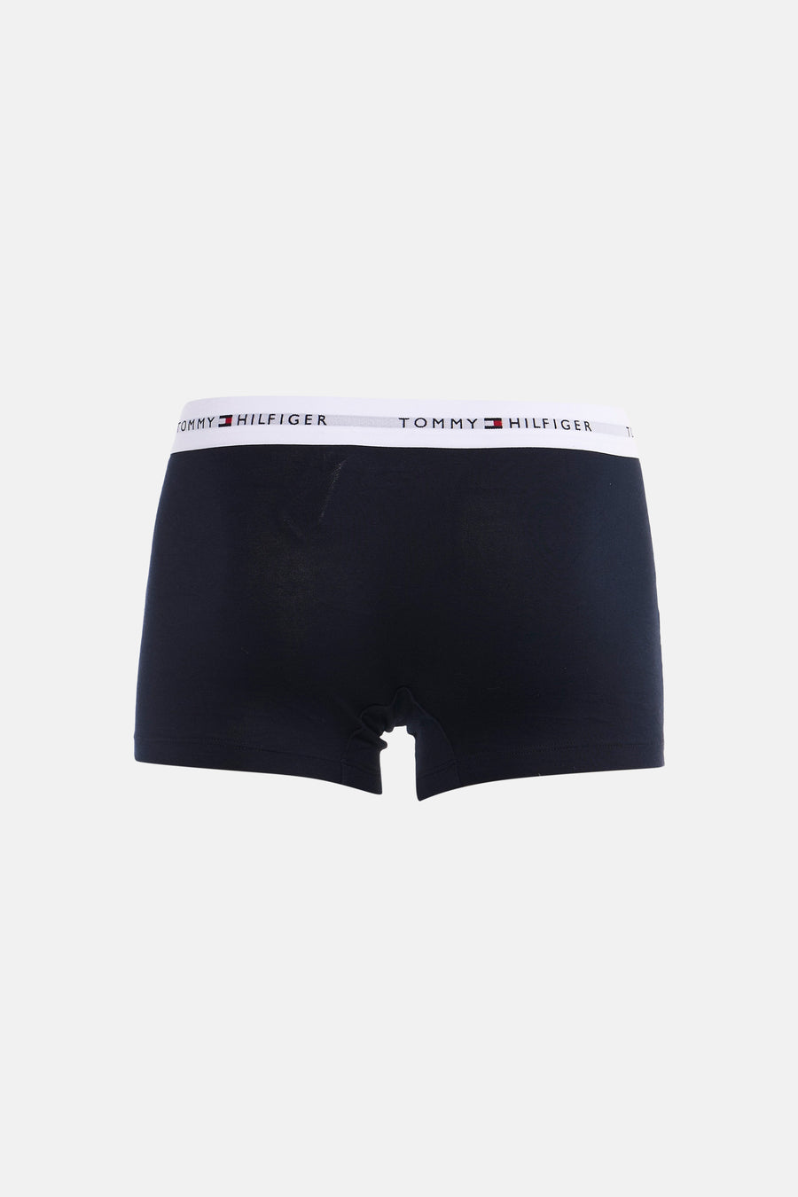 Boxer short bleu de TOMMY JEANS avec une ceinture blanche à logo, sur fond blanc.
