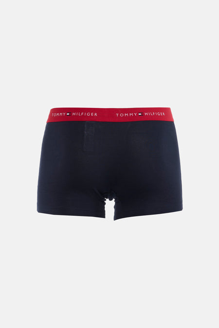 Donkerblauwe boxershort van Tommy Jeans met een rode tailleband met merklogo.
