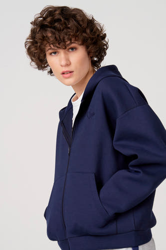 Blauw vest met ritssluiting van Unwind, met capuchon en zakken.