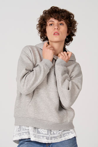Sweat-shirt à capuche gris d'Unwind, à manches longues et avec une poche sur le devant.
