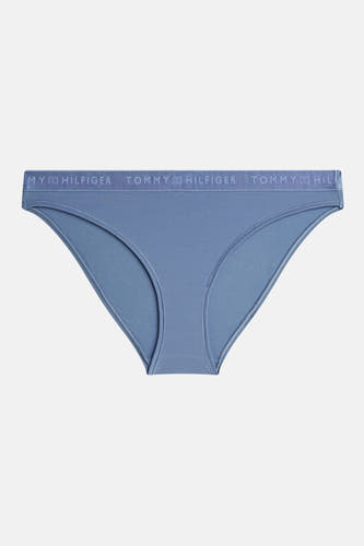 Blauwe slip van TOMMY JEANS met een tailleband met logo.

