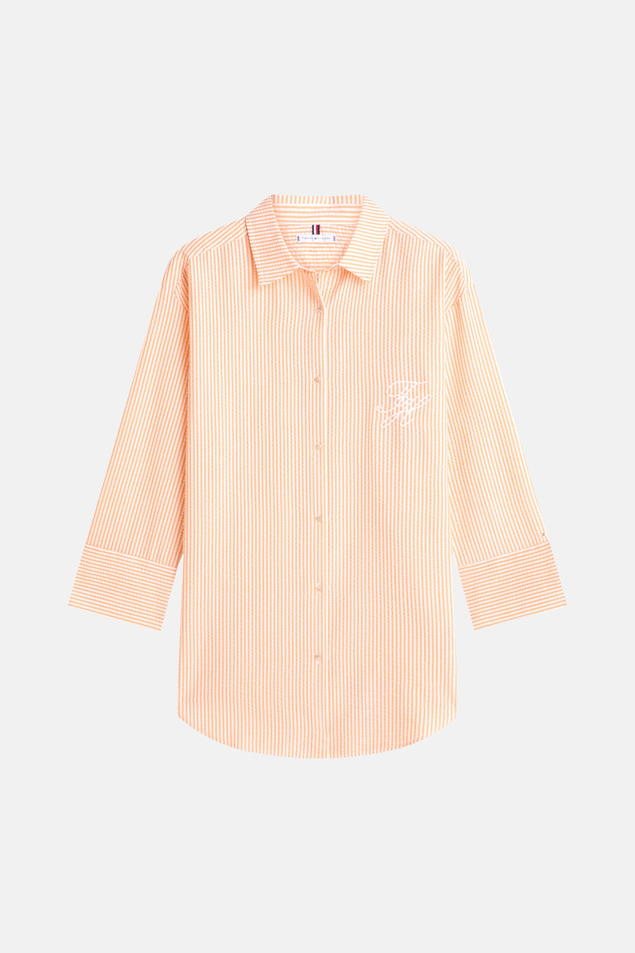 Oranje verticaal gestreept hemd met lange mouwen van TOMMY JEANS, met wit TH-monogram, knopen en opgerolde mouwen.