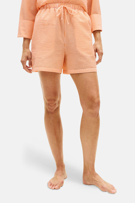 Short rayé orange de TOMMY JEANS avec cordon de serrage et logo brodé.