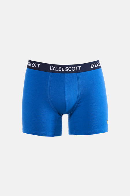 Blauwe boxershort van LYLE & SCOTT met donkerblauwe tailleband met wit logo en een klein geel adelaarlogo.