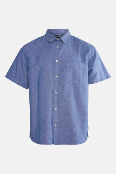 Blauw overhemd met korte mouwen van VANS “OFF THE WALL”, met knoopsluiting en borstzak.