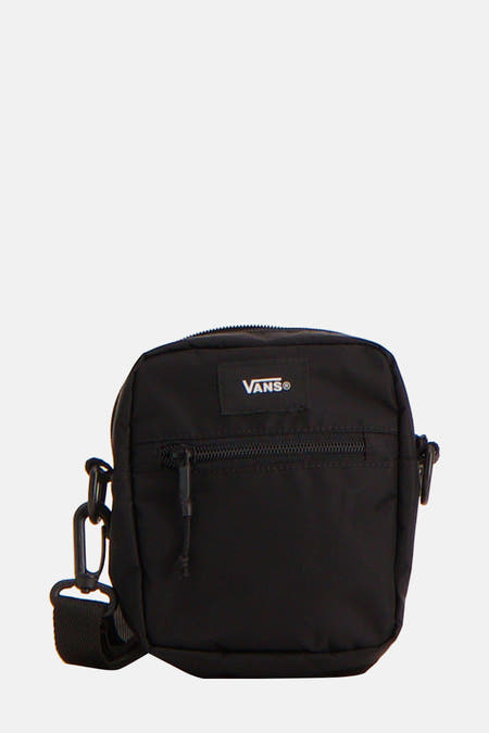 Sac à dos noir de Vans, avec fermeture éclair et sangle d'épaule ajustable.
