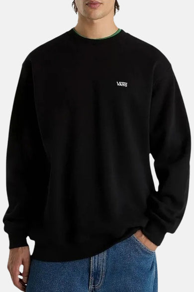 Gilet noir VANS "OFF THE WALL", avec un petit logo sur la poitrine et une col verte.