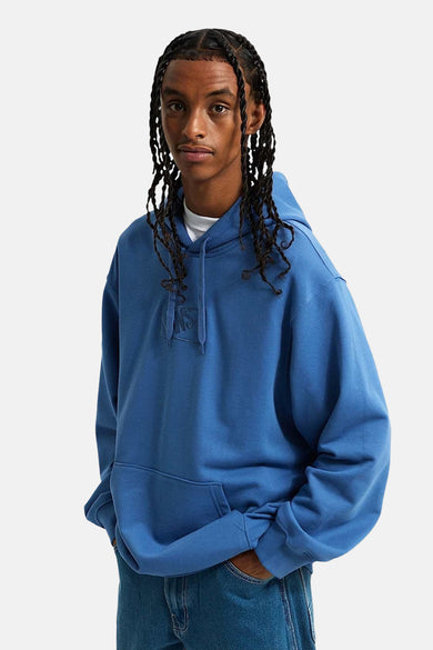 Blauwe sweater met kap van Vans, met opgestikte merknaam en casual pasvorm.