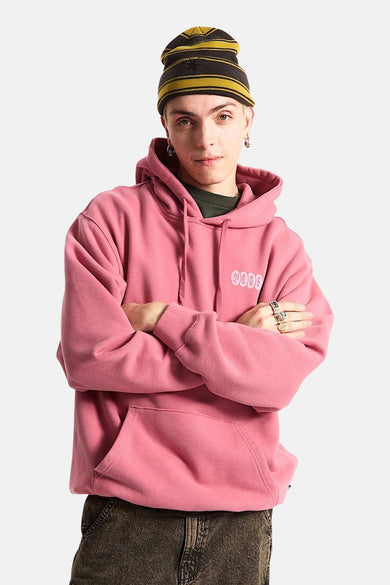 Gilet rose avec capuche VANS "OFF THE WALL", avec texte brodé et un bonnet rayé.
