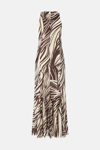 Een lang mouwloos kleedje in bruin en crème van Guess, met abstract streepdessin en halterhals met sleutelgat.