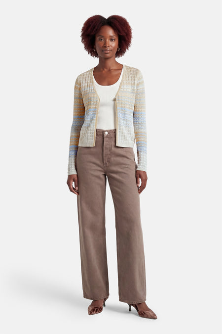 Beige gilet van Guess® met lange mouwen, openvallend en met een gestreept zigzagpatroon in blauw en oranje.