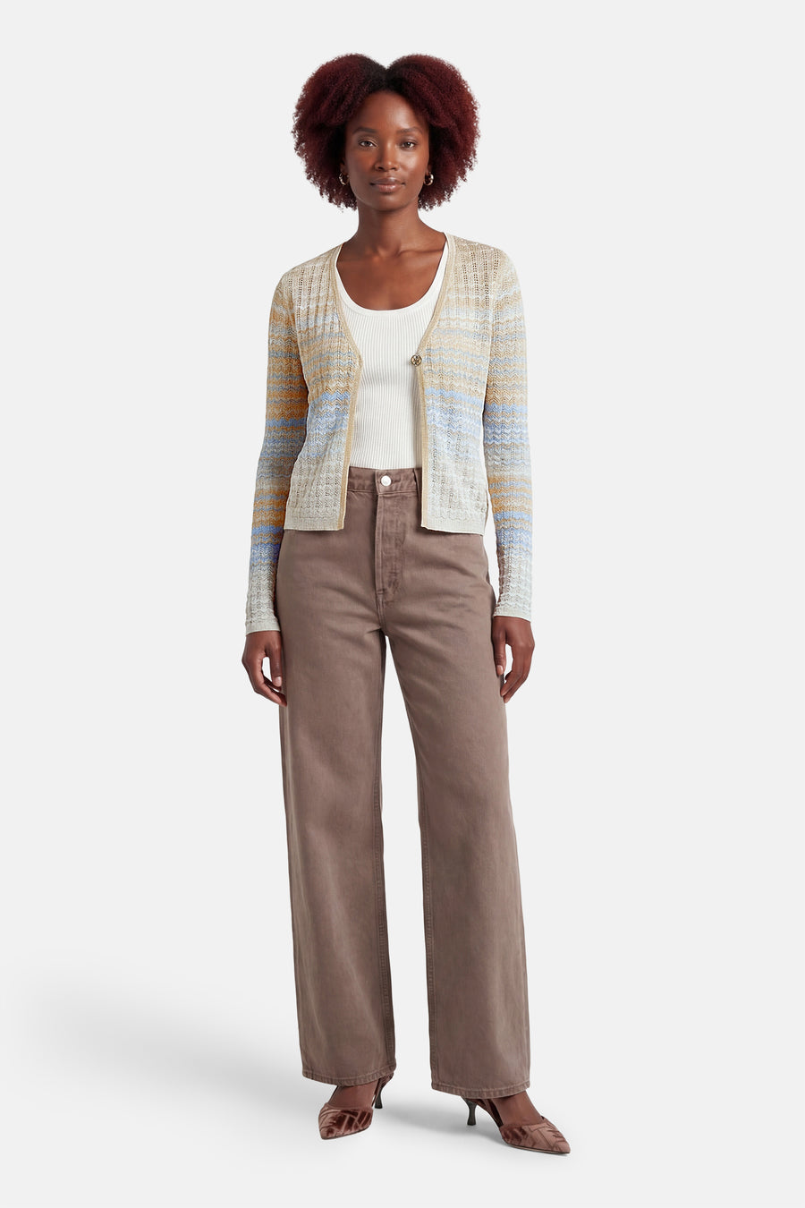 Beige gilet van Guess® met lange mouwen, openvallend en met een gestreept zigzagpatroon in blauw en oranje.