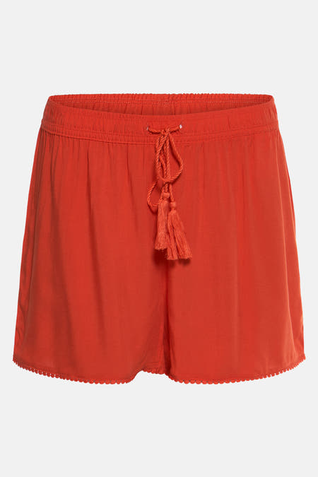 Short orange de HAILYS, avec une corde et des poils à l'avant.